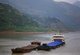 China: Barges, early morning in the Qutang Gorge, smallest of the Three Gorges, Yangtze (Yangzi) River