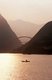 China: Sunrise over the road bridge opposite Wushan and the entrance to Wu Gorge on the Yangtze (Yangzi) River, Chongqing Municipality